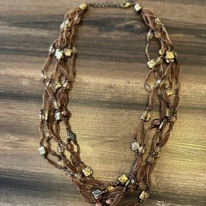 Beautiful bead and ribbon necklace from Coldwater Creek. Brown/gold/bronze